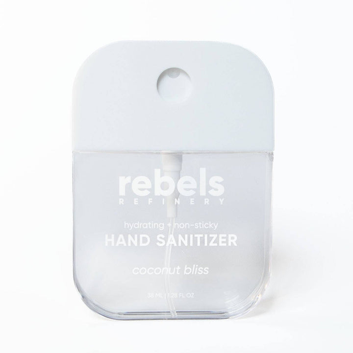 A small clear plastic hand sanitizer bottle with a frosted cap, labeled &
