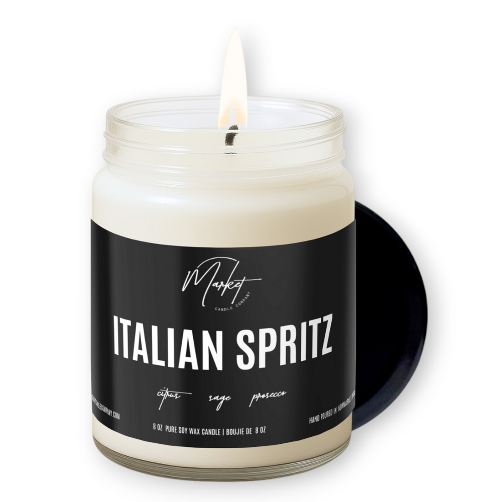 Candle labeled 'Italian Spritz' with a black label on a white background