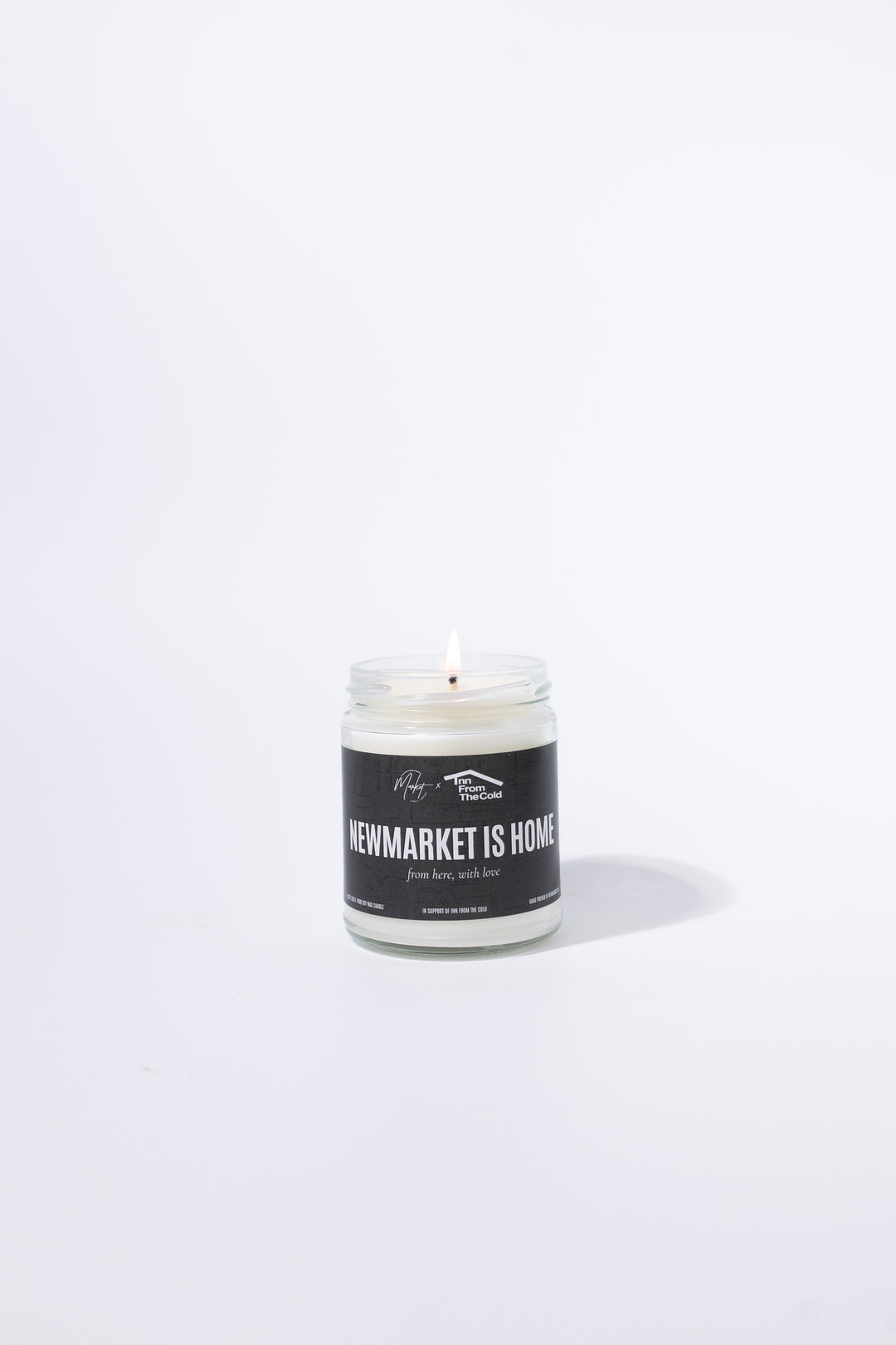 NEWMARKET IS HOME SOY CANDLE - SUPPORT INN FROM THE COLD